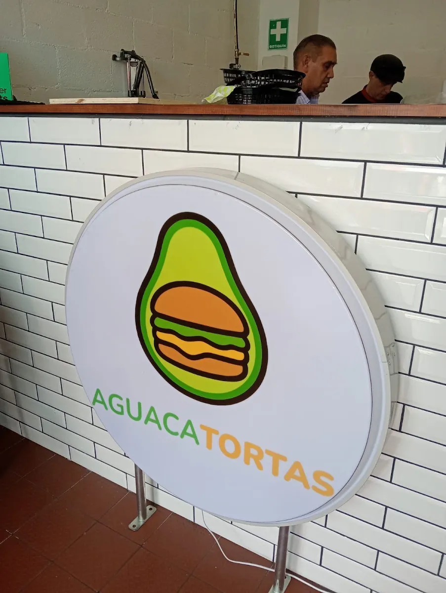 Letrero redondo con el aguacate de Aguacatortas